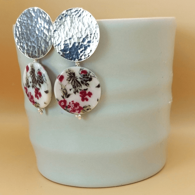 Hammered sterling silver and floral painted shell drop earrings 