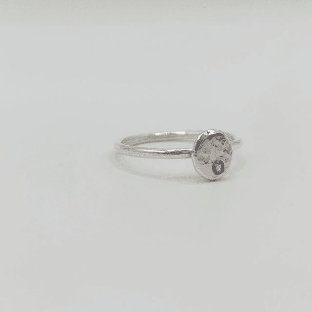 Hammered sterling silver disc ring with blue stone (size O)