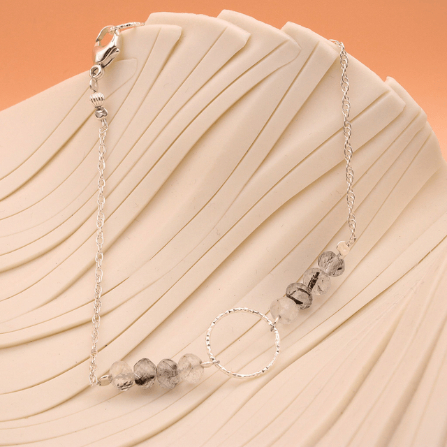 Sterling silver and tourmalinated quartz ring bracelet