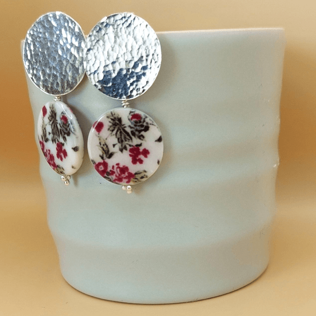 Hammered sterling silver and floral painted shell drop earrings