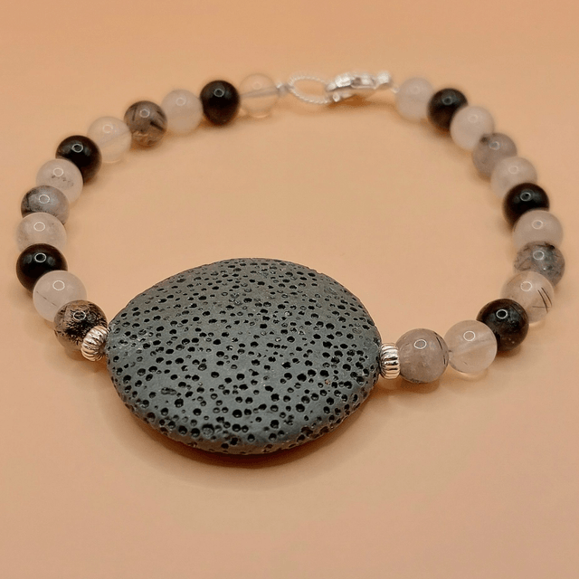 Lava (grey), tourmalinated quartz and sterling silver beaded bracelet