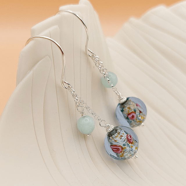 Sterling silver drop earrings with Preciosa blue floral glass and dyed jade beads