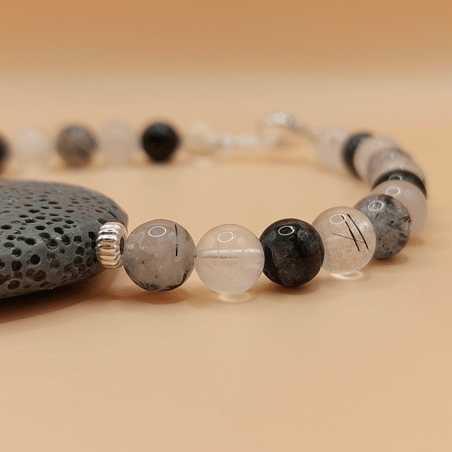 Lava (grey), tourmalinated quartz and sterling silver beaded bracelet