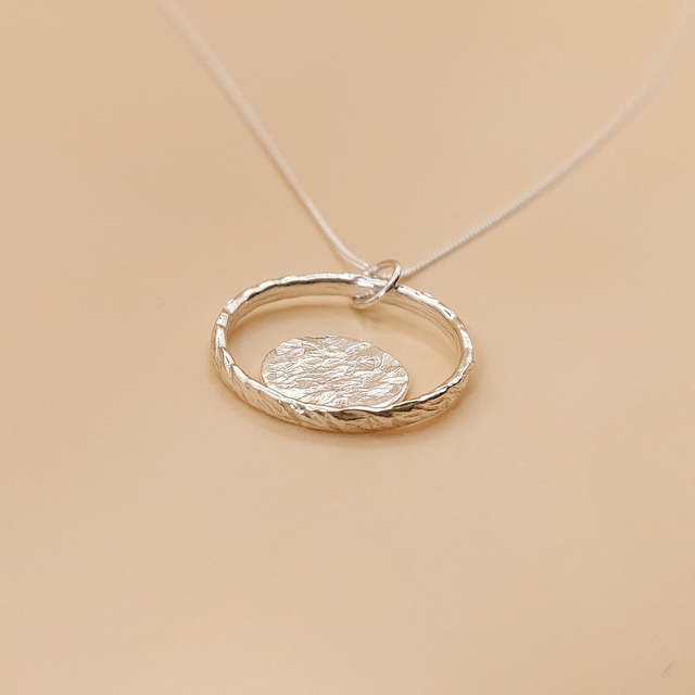 Sterling silver hammered ring with hammered disc necklace