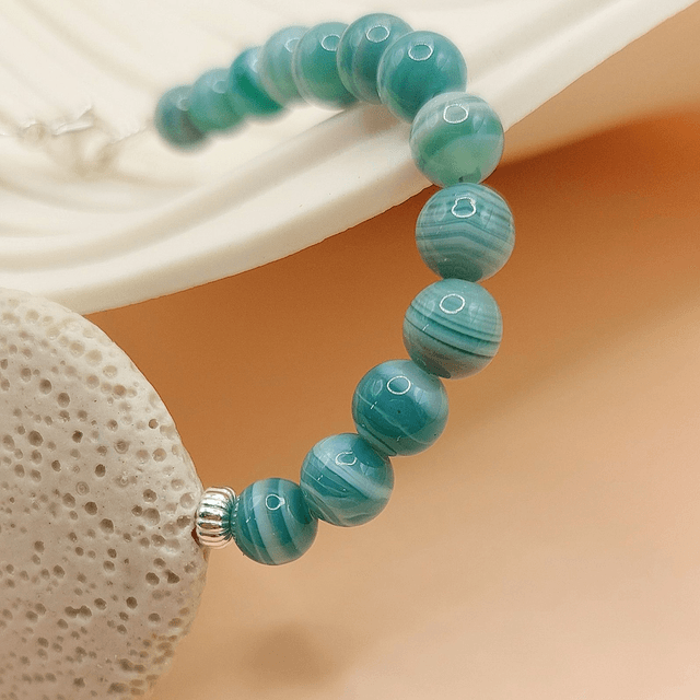 Lava (cream), striped agate and sterling silver beaded bracelet