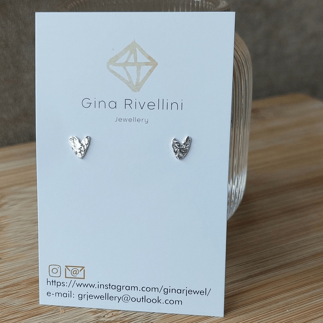 Sterling silver textured whimsical heart stud earrings