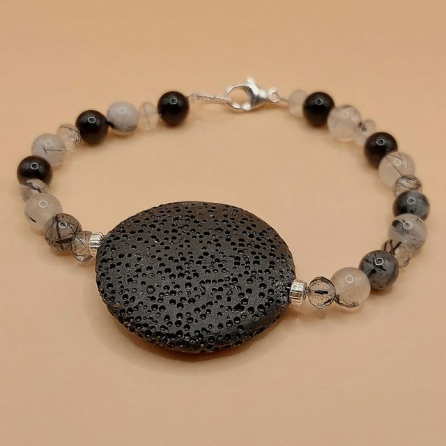 Lava (black), tourmalinated quartz and sterling silver beaded bracelet