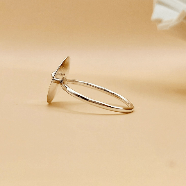 Sterling silver satin finish domed disc ring with silver nugget