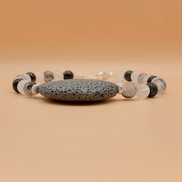 Lava (grey), tourmalinated quartz and sterling silver beaded bracelet